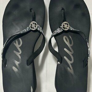 Guess Women’s Black Rhinestone Wedge Flip Flops